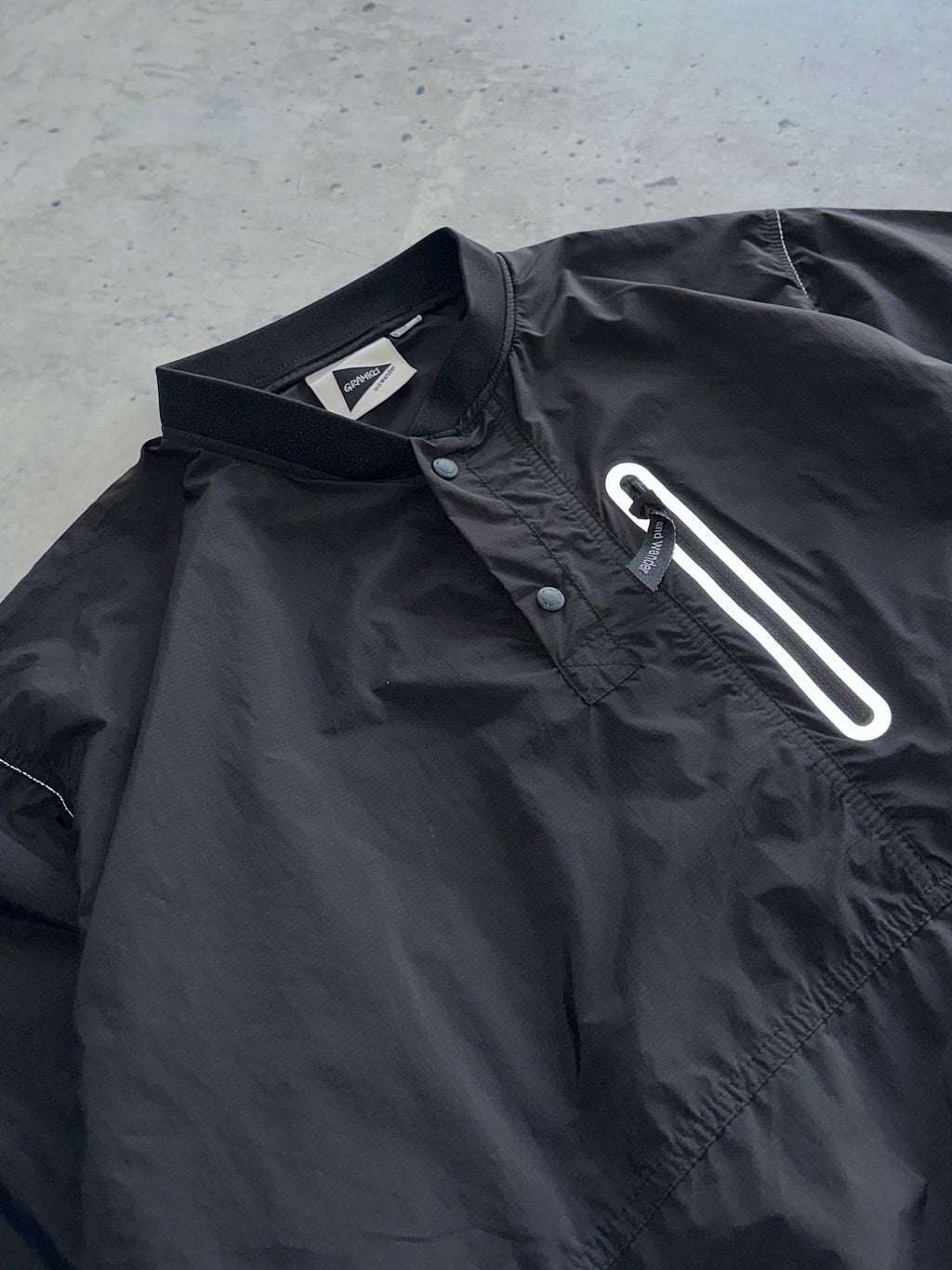 Gramicci x And Wander Reflective Patchwork Wind T Shirt (M)