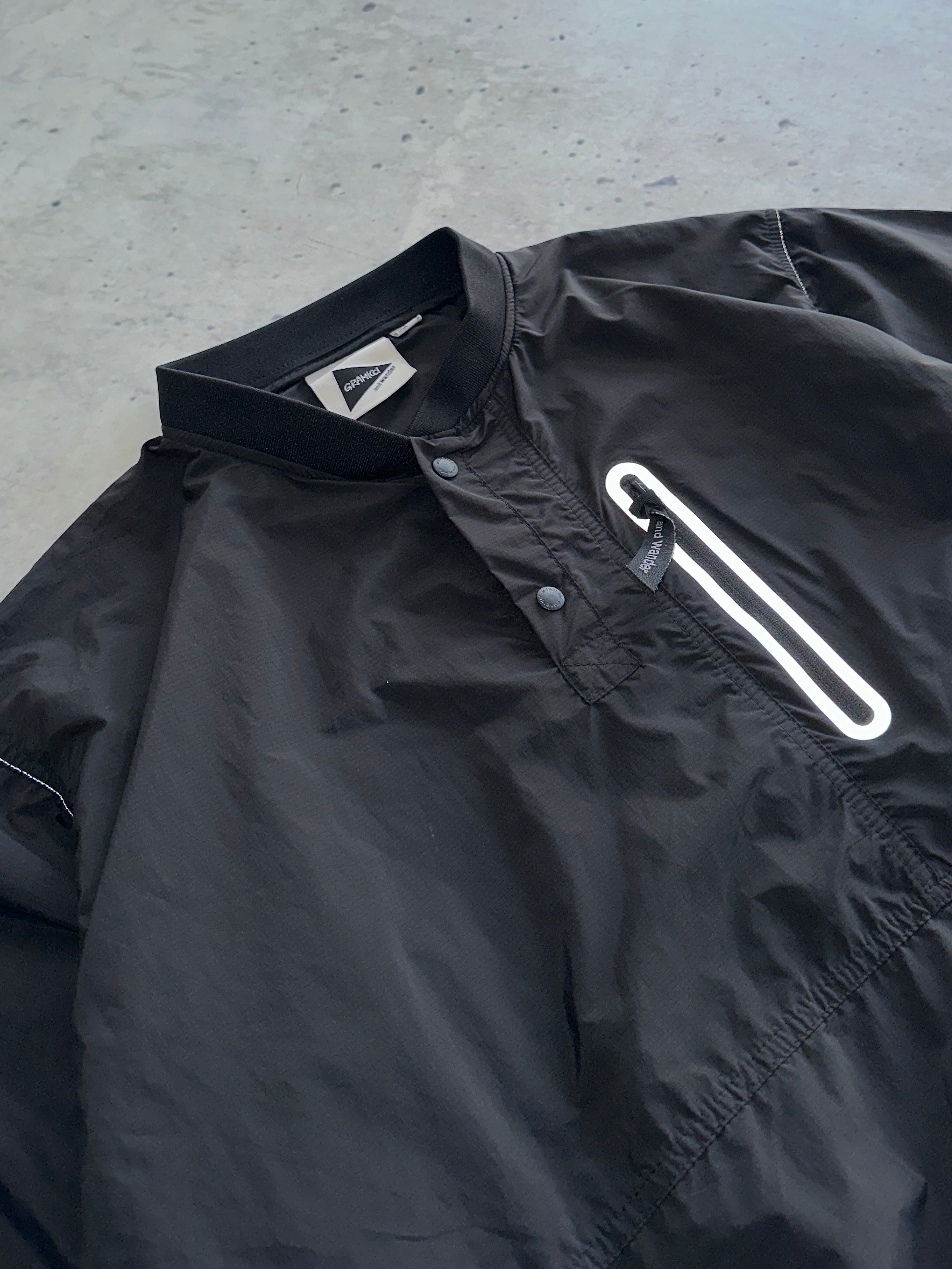 Gramicci x And Wander Reflective Patchwork Wind T Shirt (M)